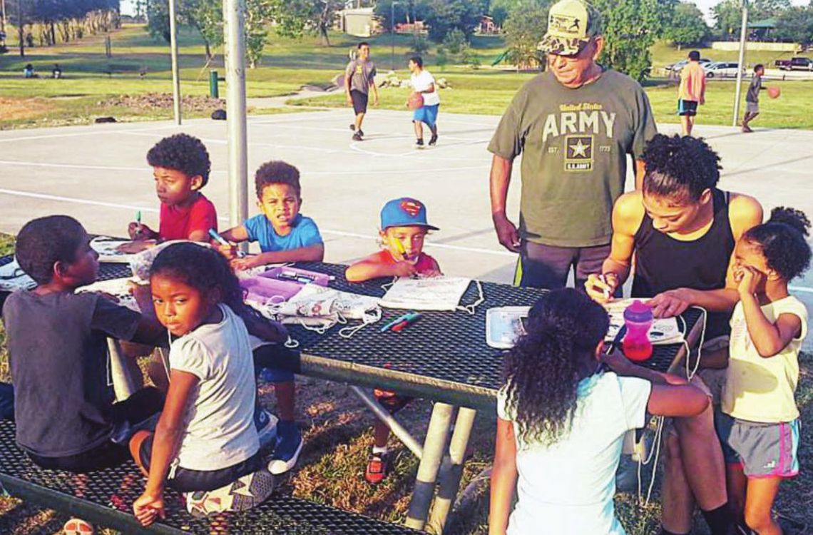 Children of all ages come together at Midnight Basketball in Fannie Robinson Park, the precursor to Basketball in the Park in this 2017 photo. File photo