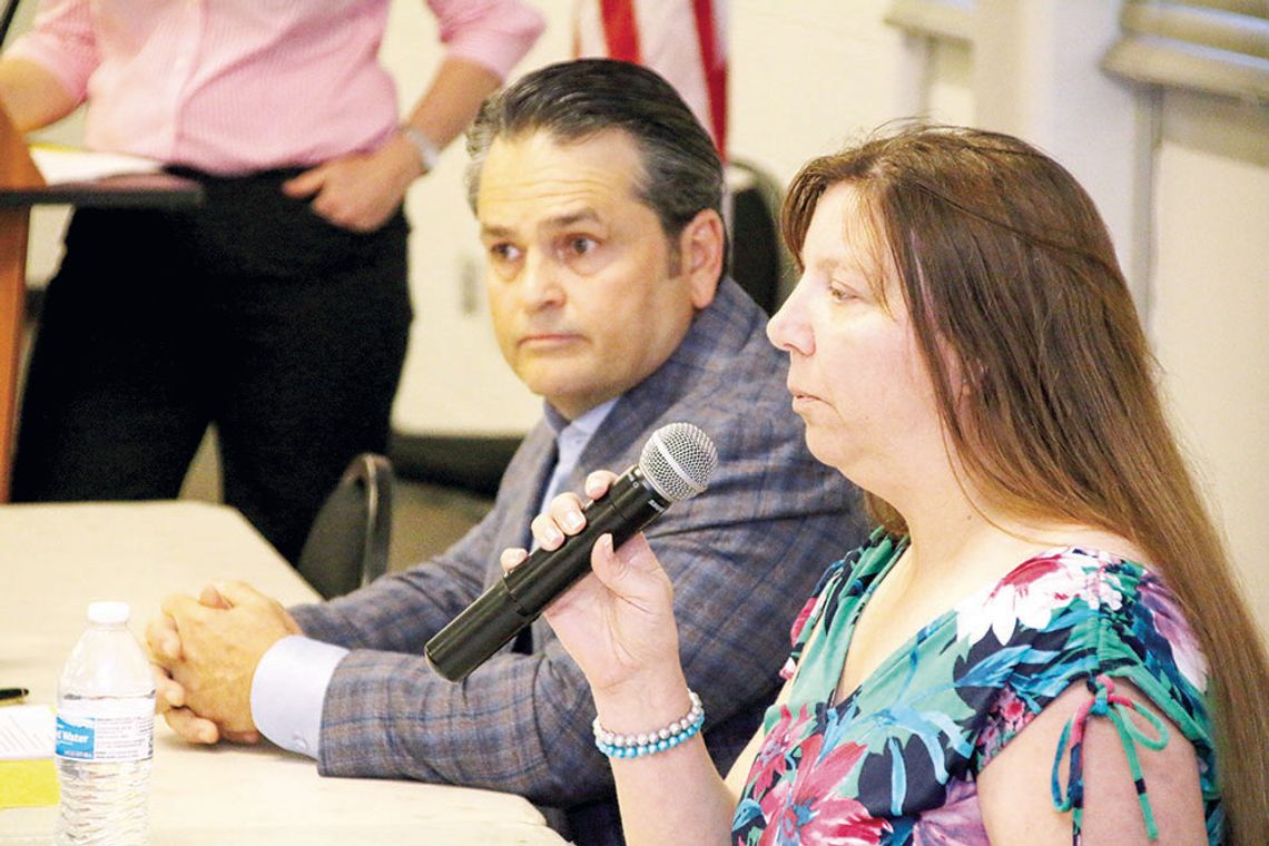 Taylor ISD at-large candidates Jim Buzan (left) and Lisa Baum answered questions during the candidate forum last week. TAYLOR ISD AT-LARGE