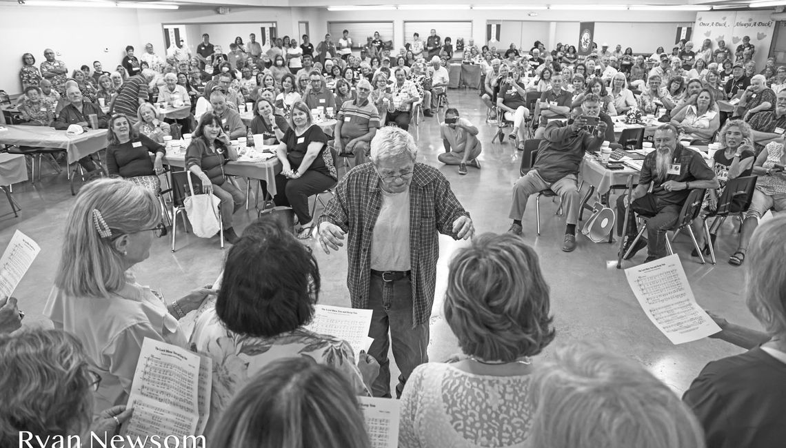 Former Taylor choir director William Kretzmeier reunites with his 1969-1970 students for a homecoming performance. Courtesy photos