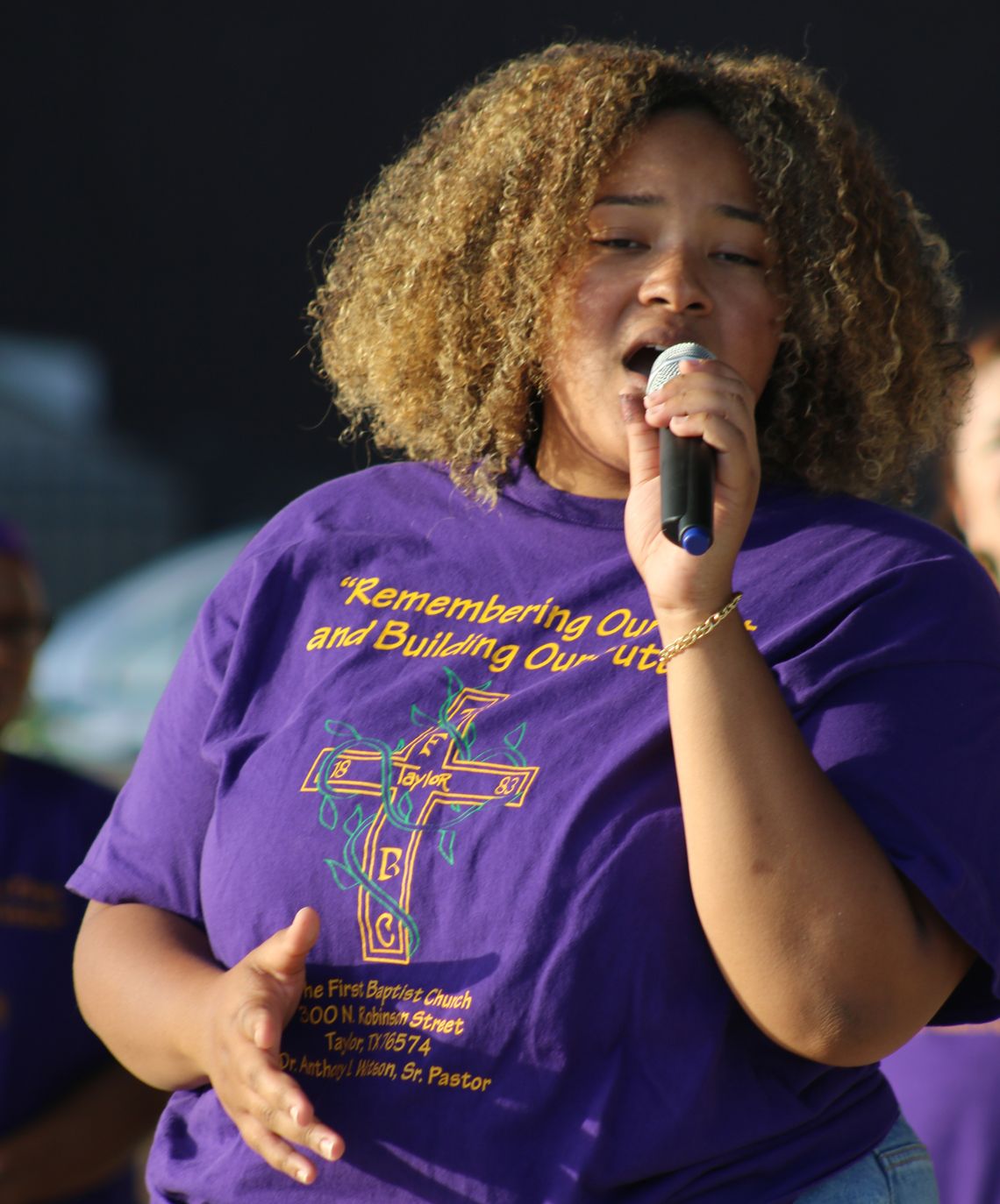 Michaela Watson returns to the stage at Heritage Square to perform at Music in the Park hosted by The First Baptist Church of Taylor. Photo by Jason Hennington