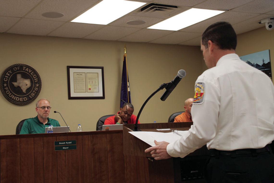 Fire Chief Daniel Baum addresses city leaders at the March 9 meeting of the Taylor City Council. Photo by Nicole Lessin