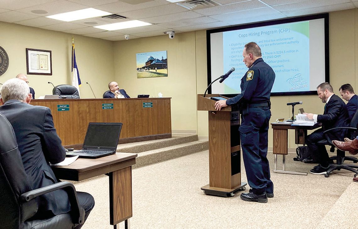 Taylor Police Chief Henry Fluck presents a federal grant proposal to the Taylor City Council at the regular meeting April 27.