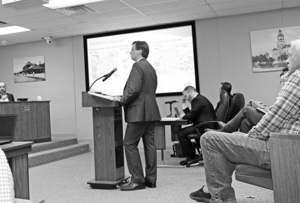 Colin Harrison, who was recently promoted to director of Development Services for the city, gives a staff report on the proposed 160-foot wireless telecommunication tower, at the April 27 meeting of the Taylor City Council.