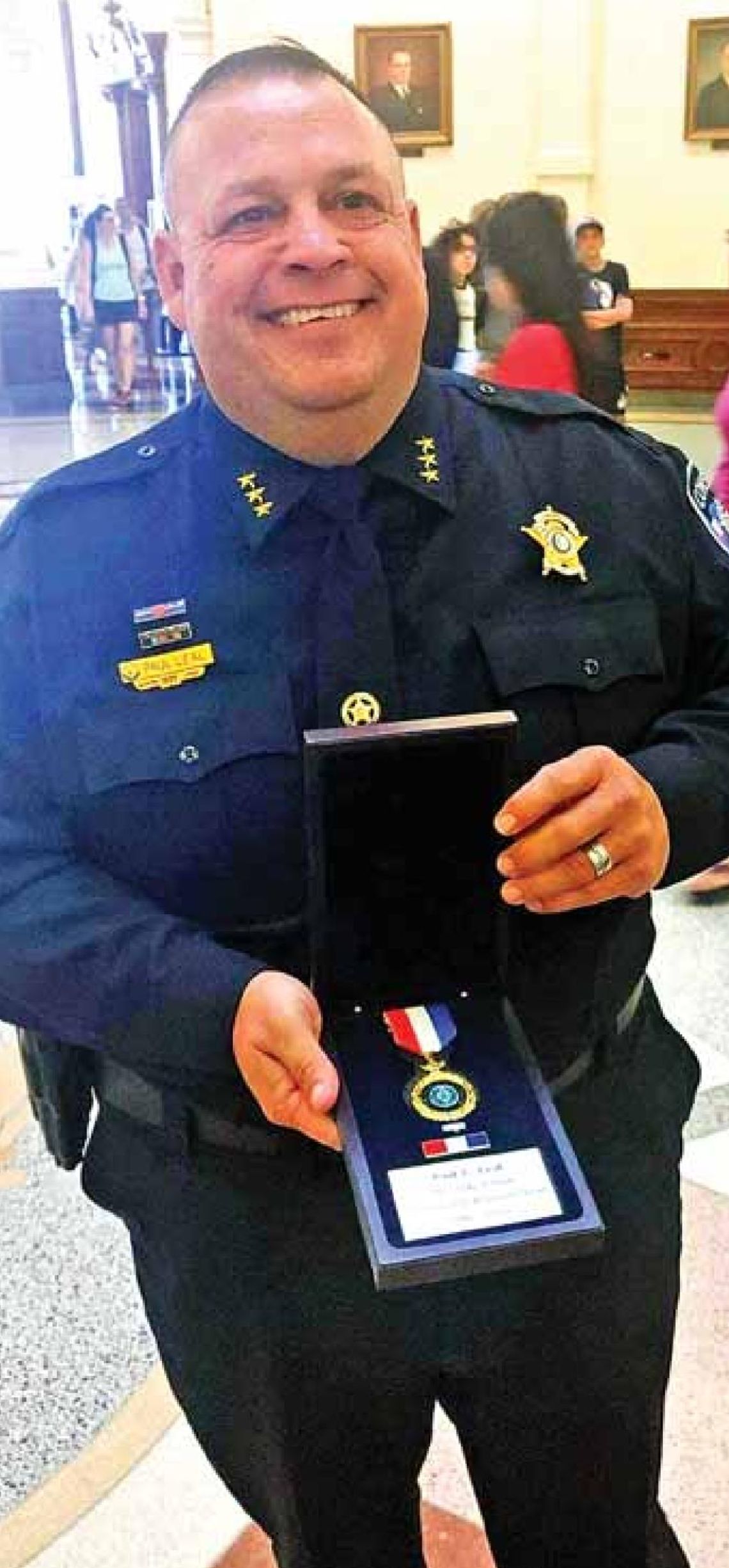 Constable Paul Leal smiles with his award presented at the House of Representatives Chamber at the State Capitol in Austin June 10. Courtesy photos