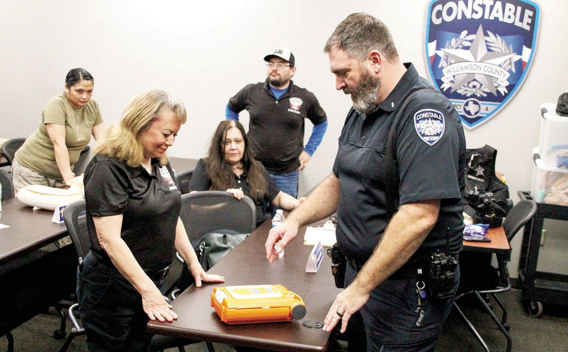 Constables teach chest compression procedures