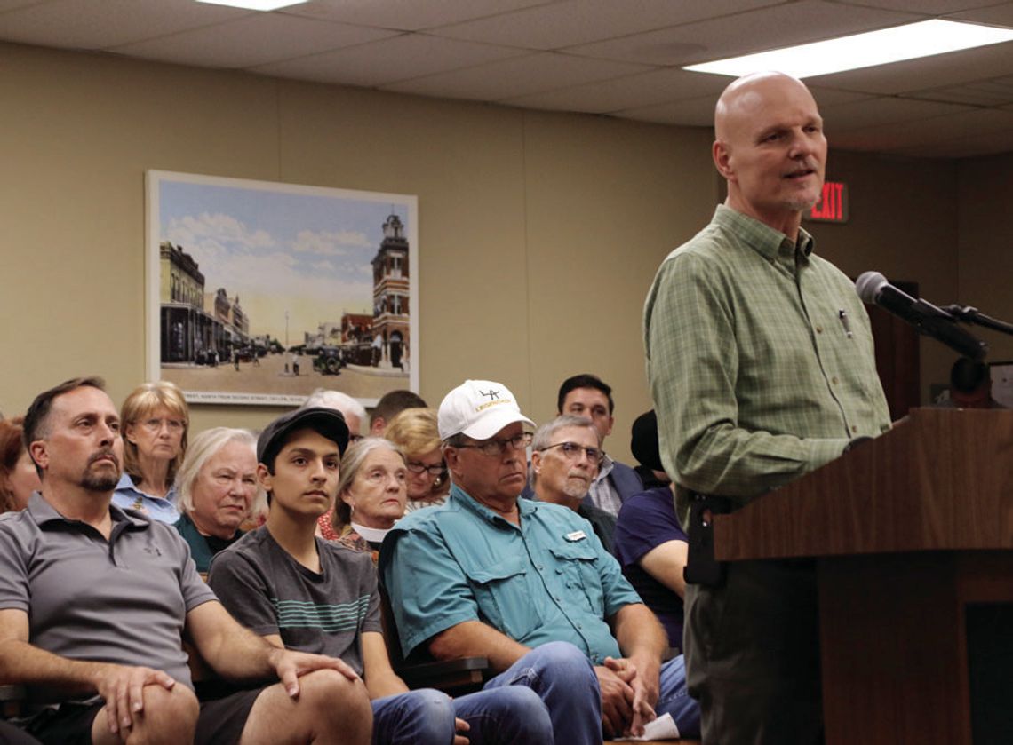 Pastor Jeff Ripple speaks in the Dec. 8 council meeting about an agenda item about a new policy for city co-sponsored events. Photo by Jason Hennington