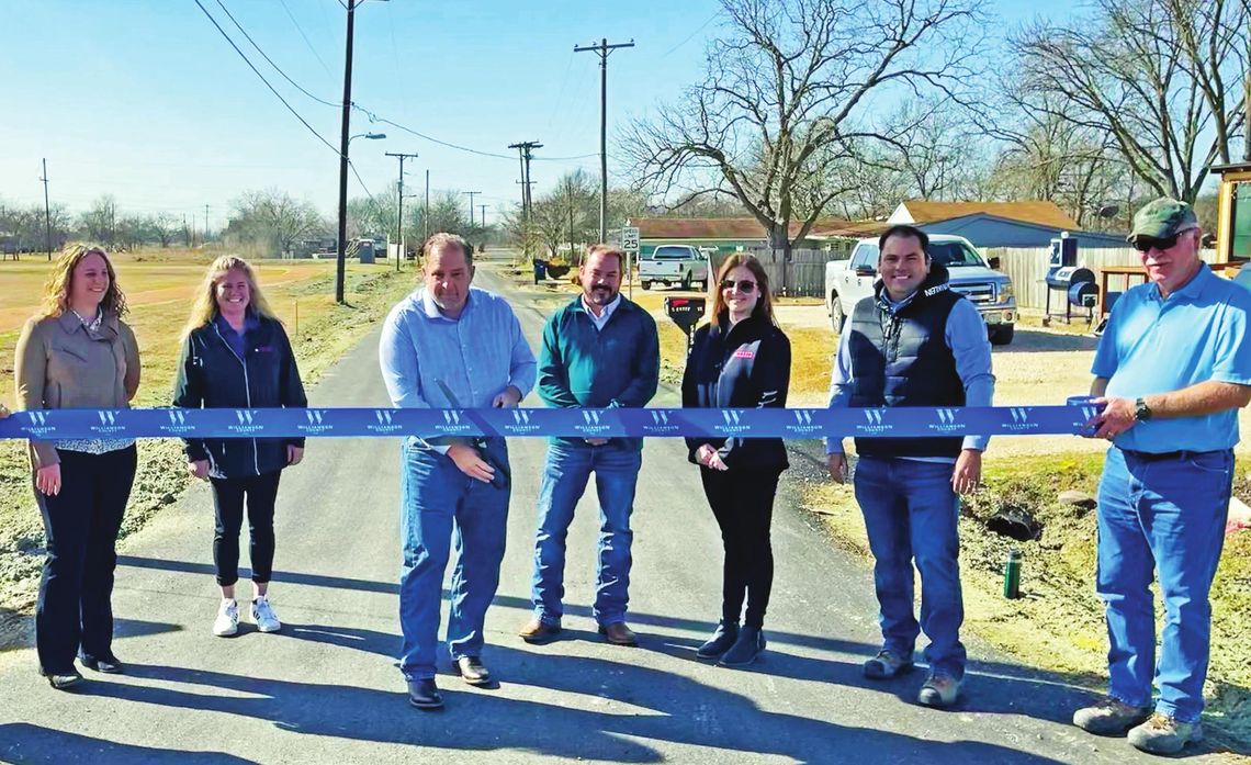 Pictured are Kim Scherer, HNTB; Tina Rutterford, Chasco Construction; Precinct 4 Commissioner Russ Boles; Mayor Chad Mees; Stacy Jo Hunter, Chasco Construction; Oscar Salazar-Bueno, HNTB; and Clayton Weber, HNTB. Courtesy photo