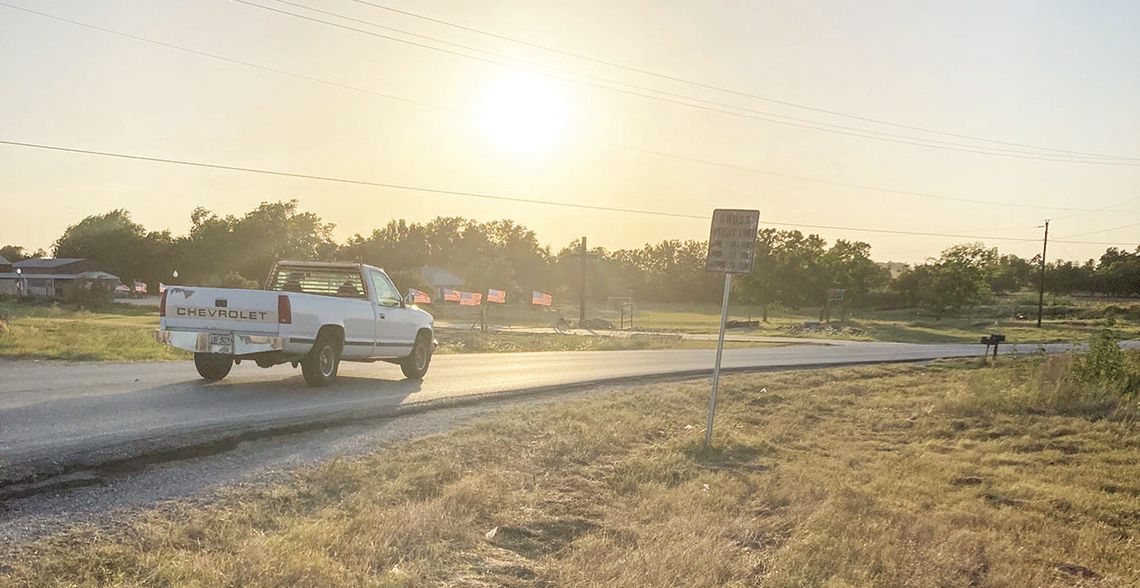 A truck drives along County Road 366 July 13 in Taylor. The road between Carlos G. Parker Boulevard and Chandler Road will close until June 2024 beginning next week. Photo by Nicole Lessin