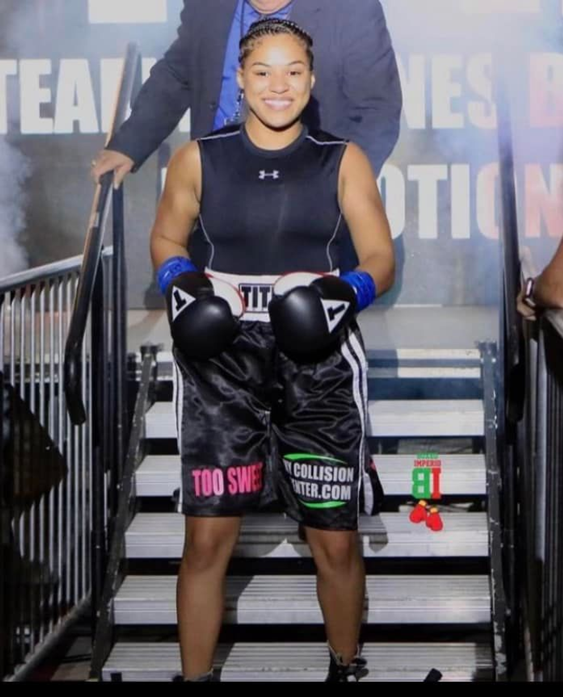 Fit to fight and ready to go. As usual Destiny “Too Sweet” Jones is all smiles as she prepares to go into battle in the ring. 