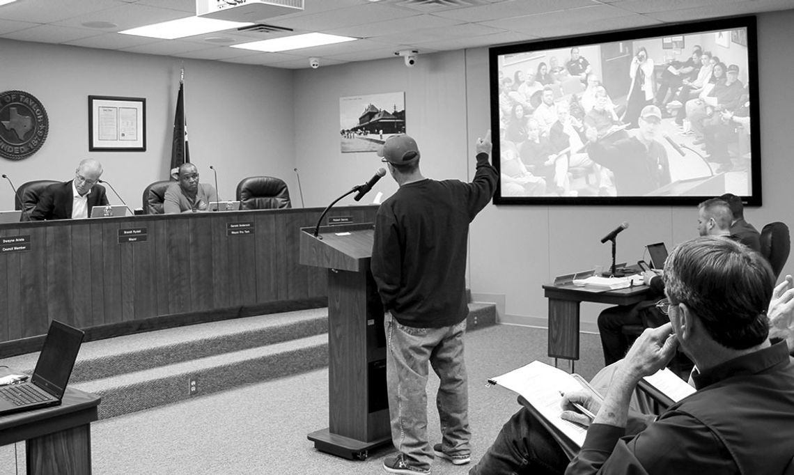 Brian Winkler speaks during a public hearing Feb. 23. Photo by Nicole Lessin