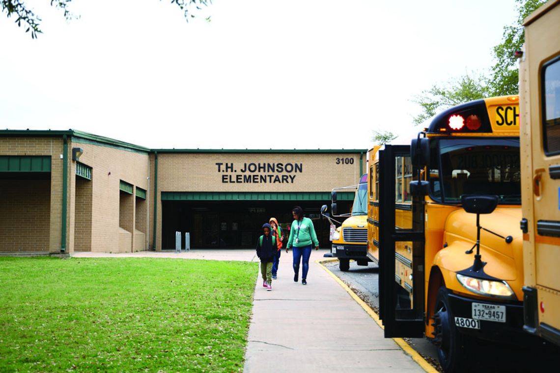 The district is implementing different measures to boost attendance, including at TH Johnson Elementary School, which has hovered around a 90 percent attendance rate since January. Photo by Ryan Newsom