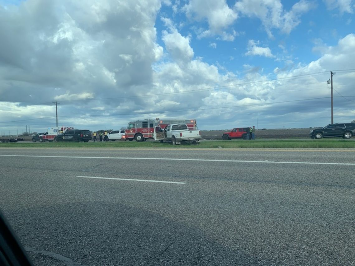 Firefighters and peace officers clear the scene of a fatal accident on U.S. 79 near Limmer Loop in Frame Switch between Taylor and Hutto. Photo by Evan Hale