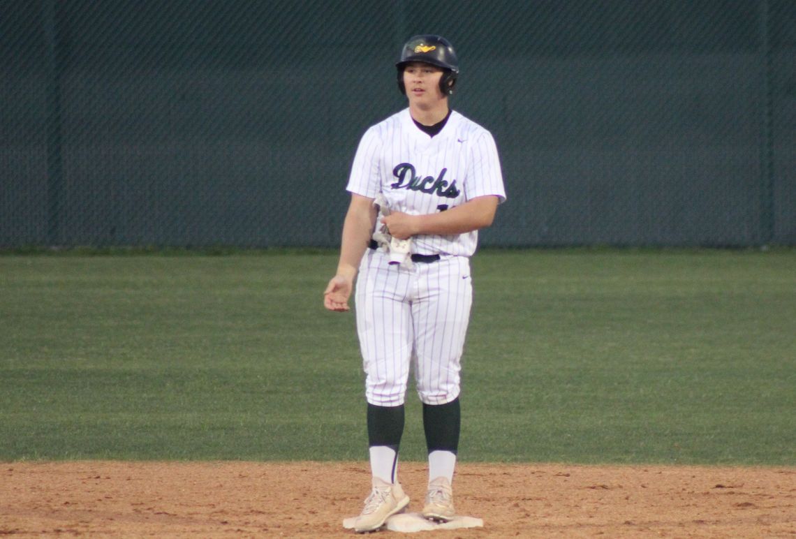 The gloves come off as Taylor’s Chris Perez means business collecting four hits against Burnet in Tuesday night's 10-2 win over the Bulldogs. 