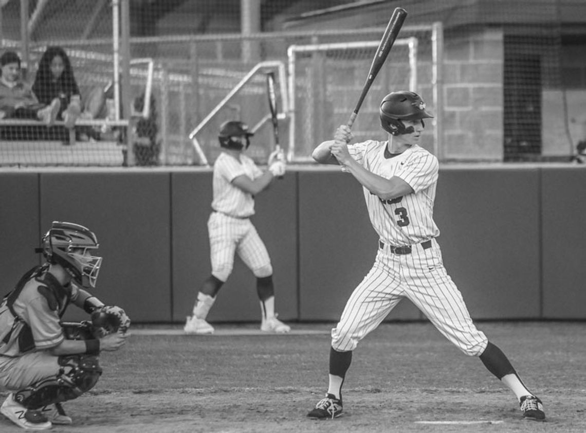 Jake Jansky standing in the batter’s box before hitting an RBI single. Photo By Larry Pelchat