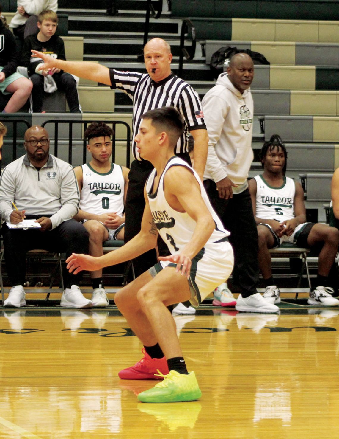 Ducks senior Ladon Velasquez looking for a steal on defense. Photo by Evan Hale