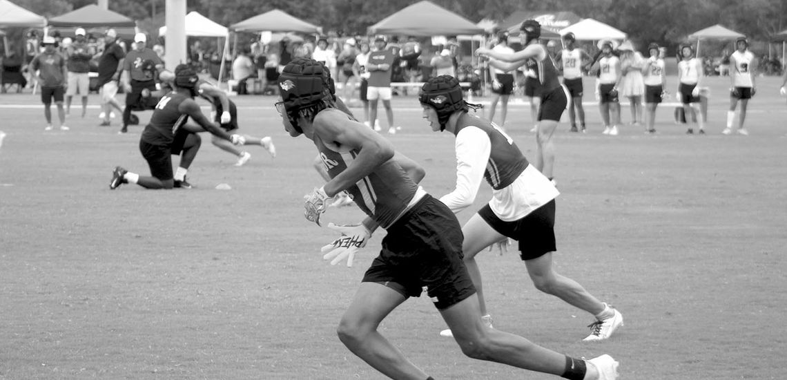 Ducks varsity football senior wide receiver Treos Richardson and the Taylor offense run a play on June 22 during a 27-26 victory over Midland Christian. Photo by Andrew Salmi