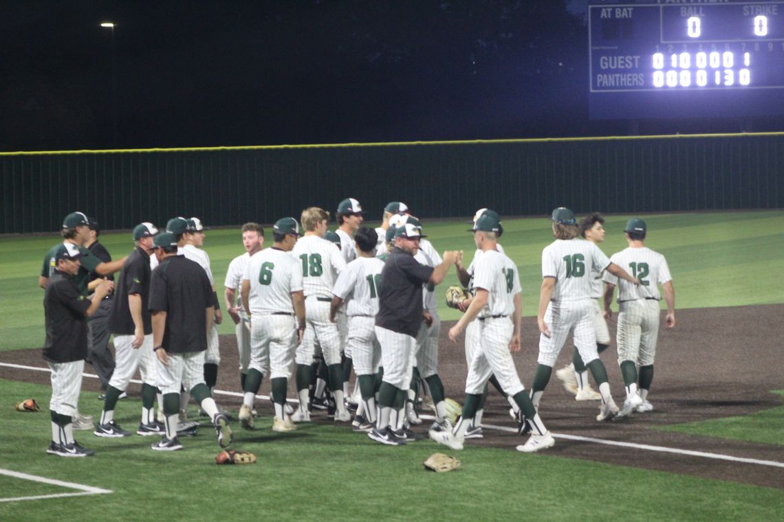 The Taylor High School varsity baseball team celebrates on Thursday, May 25 after the Ducks’ 4-2 victory over Spring Hill High School in Game 1 of the 4A regional semifinals in Midlothian. Photos by Andrew Salmi 
