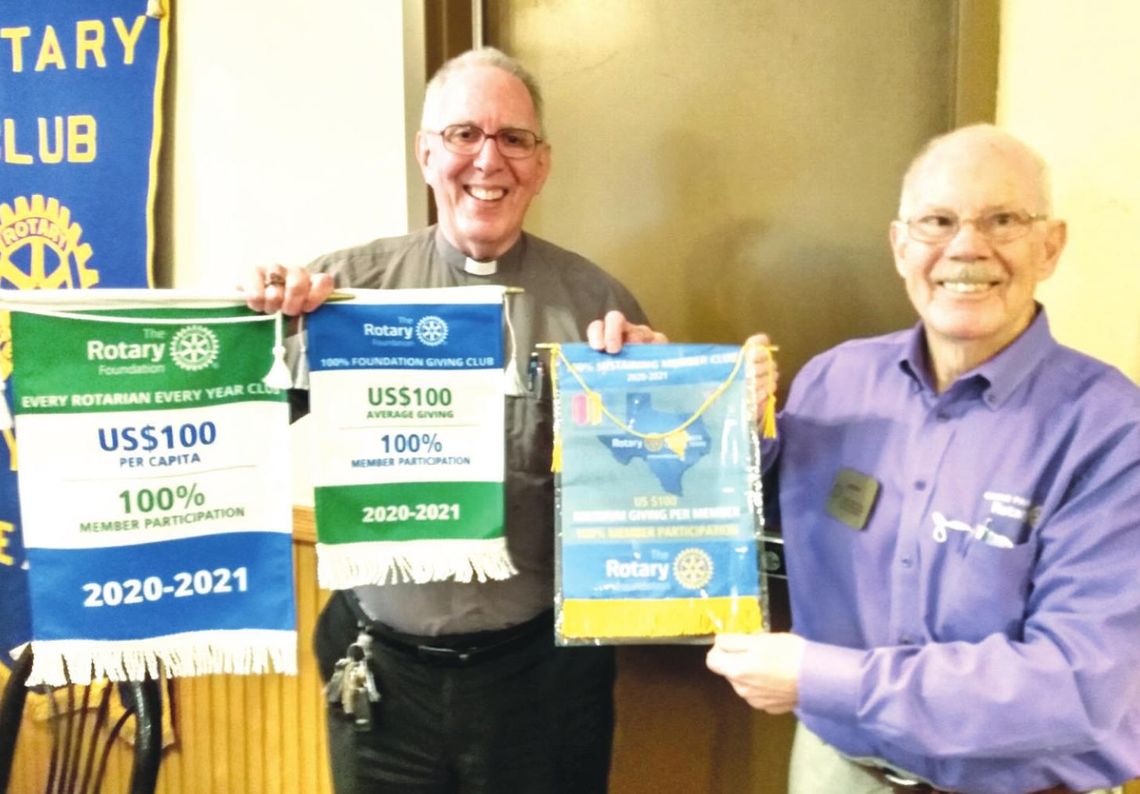 Taylor Rotary Club received three recognitions for the organization’s outstanding work in the community. Past district governor Jerry Chapman (right) presented the awards at the Jan. 27 meeting, who is seen here with Pastor George Qualley. Courtesy photo