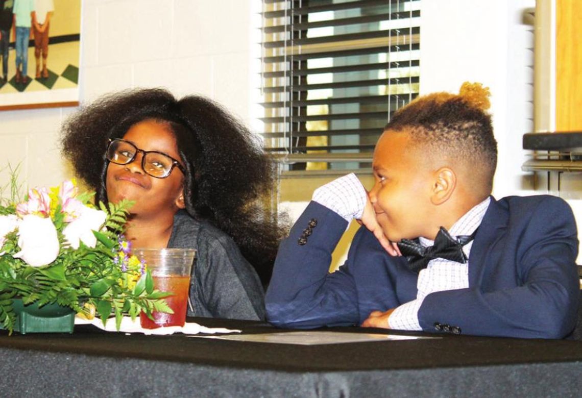 Audrey Griggs gets ready to receive her Junior Youth of the Year recognition while Kaishon Ford looks on during the B&amp;GC of East Williamson County annual banquet in Taylor March 31. Photo by Fernando Castro