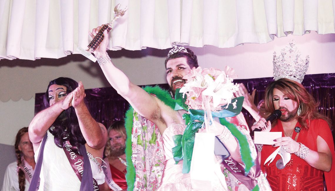 Miss Communication, Robert Garcia (left), crowns and congratulates Bad Decision Bambi, Sasan Hatami, who was named the 2023 Miss Dudes as Dames. Photo by Catherine McGary