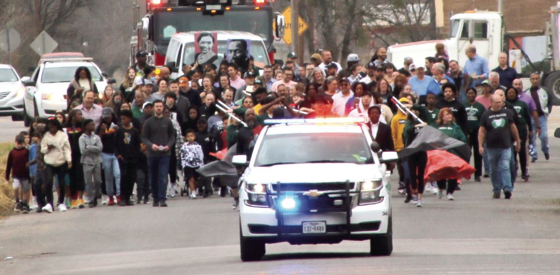 The Martin Luther King Jr. Day march returned after a three-year hiatus. Community members joined the march and the program afterwards in Heritage Square.