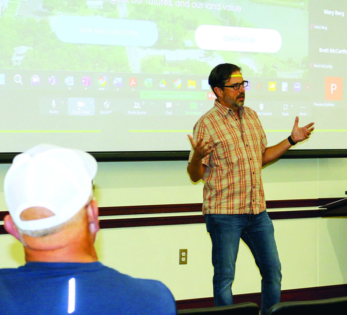 Chris Johns, attorney, explains the different areas of the Taylor map, including the ETJ and the area that Manville Water services. Photo by Edie Zuvanich