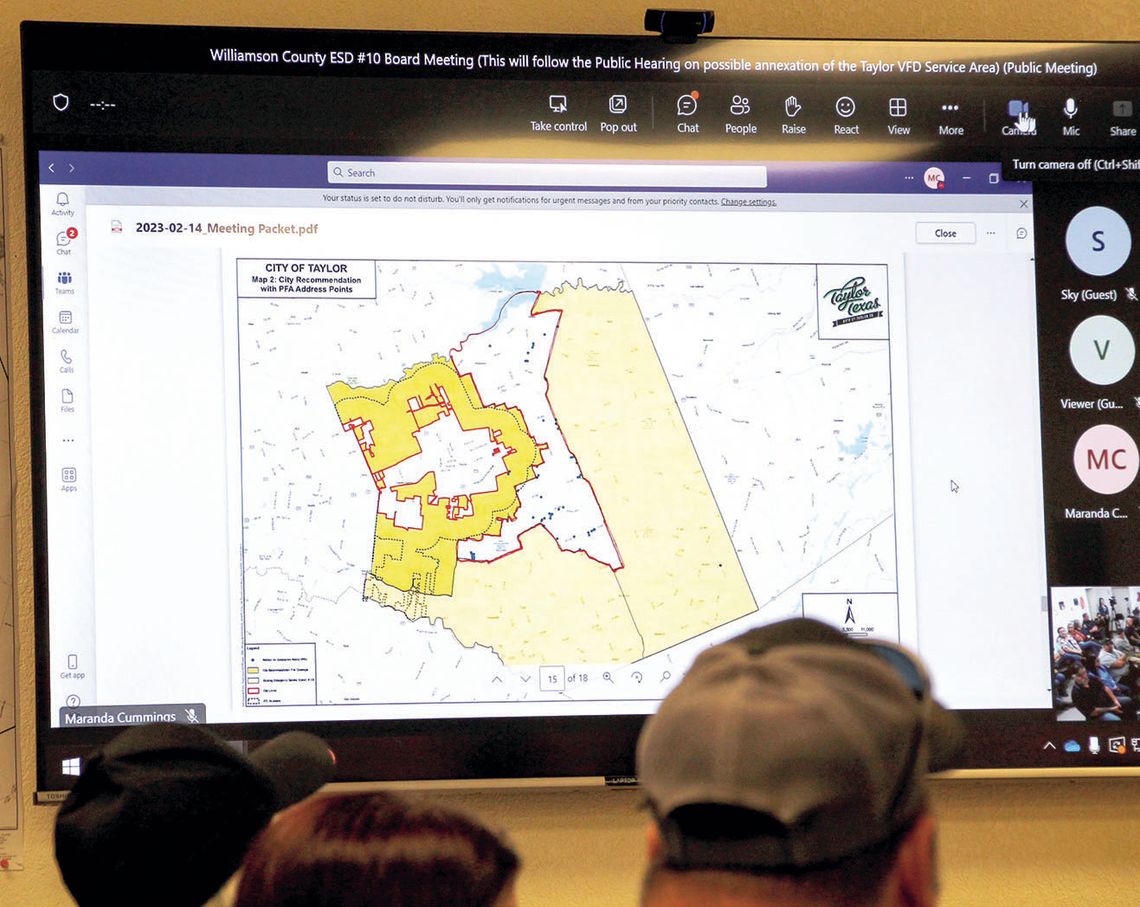 At the Feb. 14 meeting of the Williamson County Emergency Services District No. 10 Board, commissioners look at a map of a boot-shaped portion of Taylor’s Extraterritorial Jurisdiction for annexation, which was recently approved by voters. Photo by Nicole Lessin