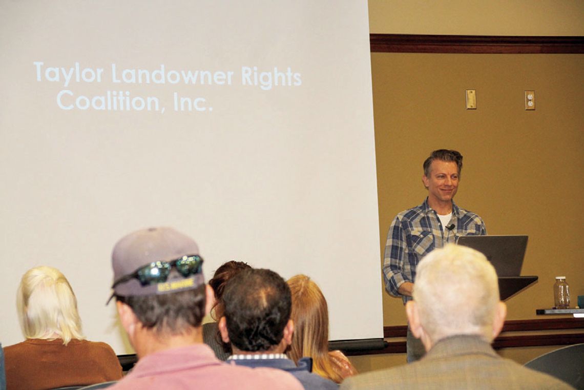 Attorney Chris Johns addresses a group of landowners Jan. 19 at the Taylor Public Library. Photo by Nicole Lessin