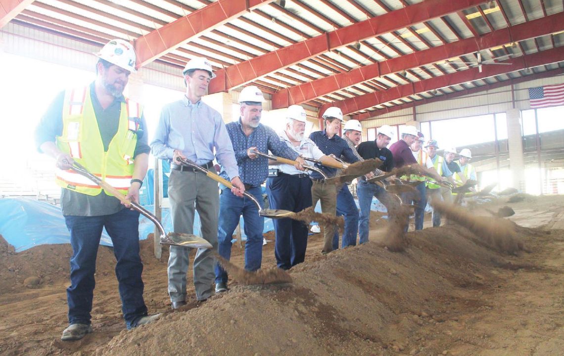 Williamson County officials and more celebrate the groundbreaking of arena improvements to the Williamson County Expo Center in Taylor Feb. 11. Pictured are, from left, Dave Mireles, Dale Butler, Michael Cooper, Scott Badgett, Trent Jacobs, Russ Boles, Jason Brown, Russell Fishbeck, Bill B...