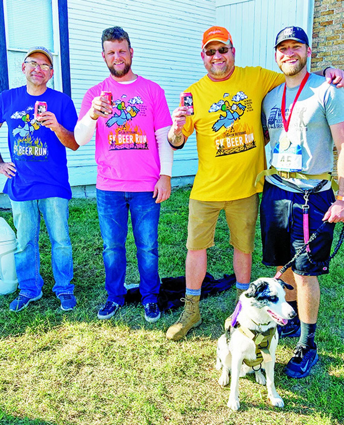 Race organizer Scott Dean, commander of the American Legion Graham D. Luhn Post 39 in Taylor, visits with Matthew Drummond, Ned Rhoades Jr., and Jace Gilbreath Nov. 5 at the after party. Photos by Nicole Lessin