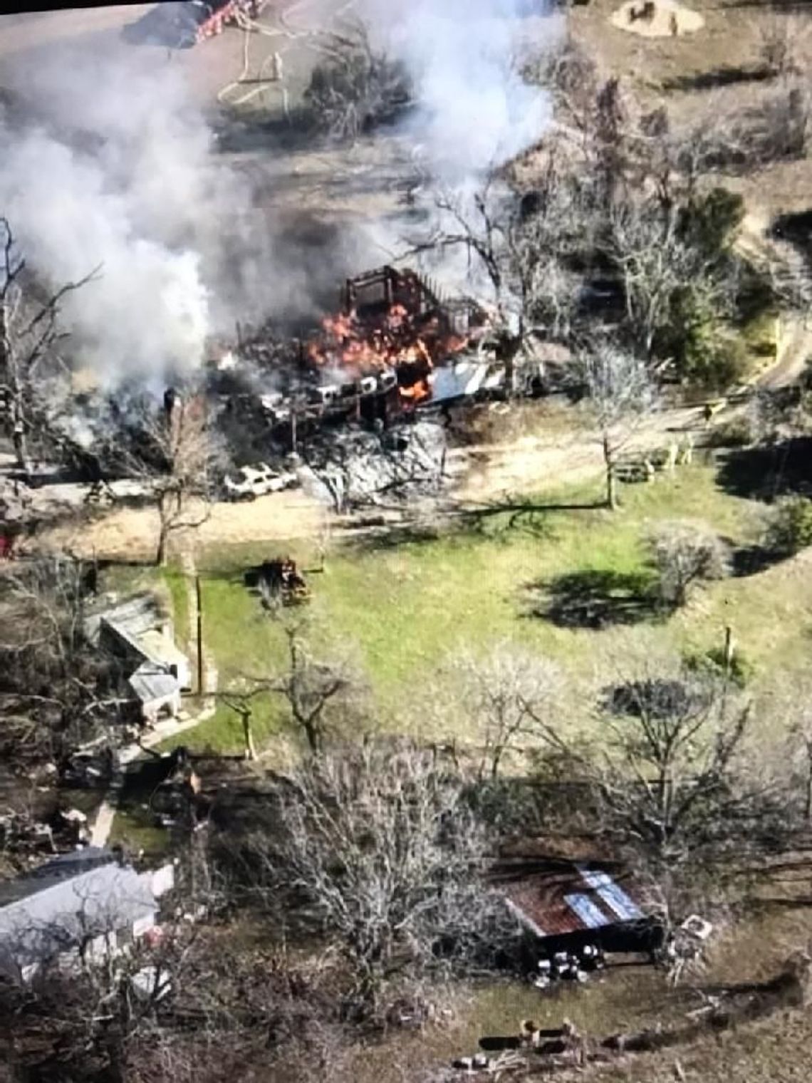 Fire consumes structure on Taylor's edge