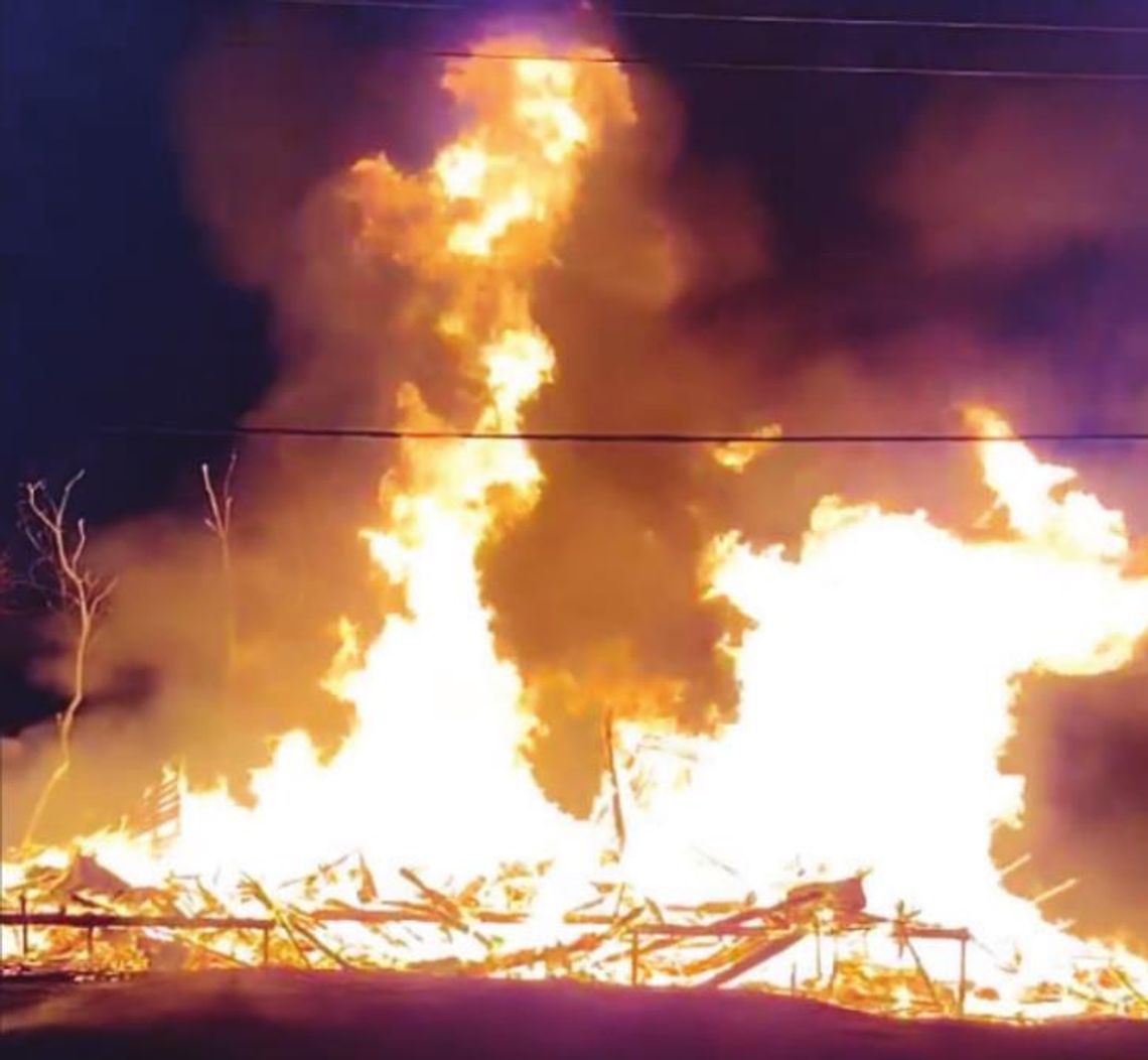 Fire demolishes the historic home of Dr. James Lee Dickey in the 500 block of Burkett Street in Taylor July 10. Courtesy video / Mike Fish