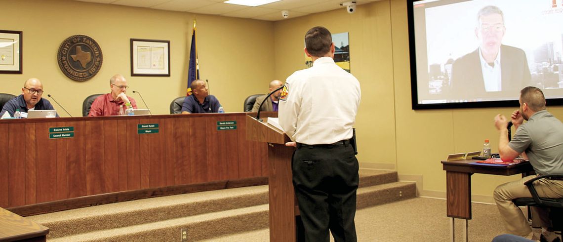 Chief Baum discusses the Fire Services Master Plan with Citygate consultant Stewart Gary at the Feb. 22 special meeting. Photo by Nicole Lessin