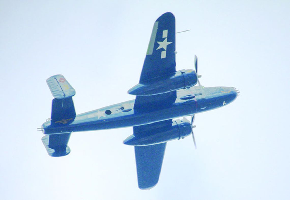 The Veterans Day airshow in Hutto may be the only one of its kind. Several vintage WWII era planes circled around all eight school in Hutto ISD. Photo by Edie Zuvanich