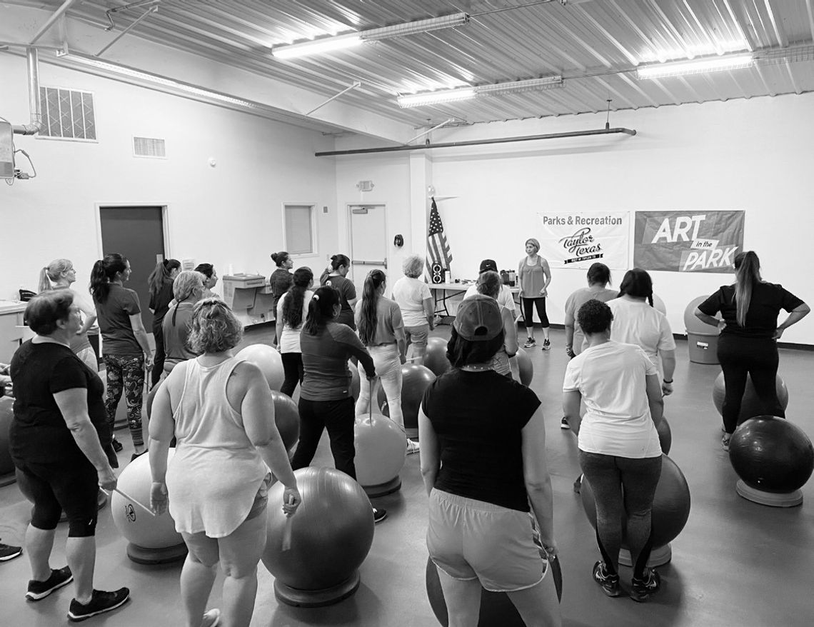 Participants prepare to get fit while drumming on exercise balls during the drum fit class. Photos courtesy of Julie Rydell