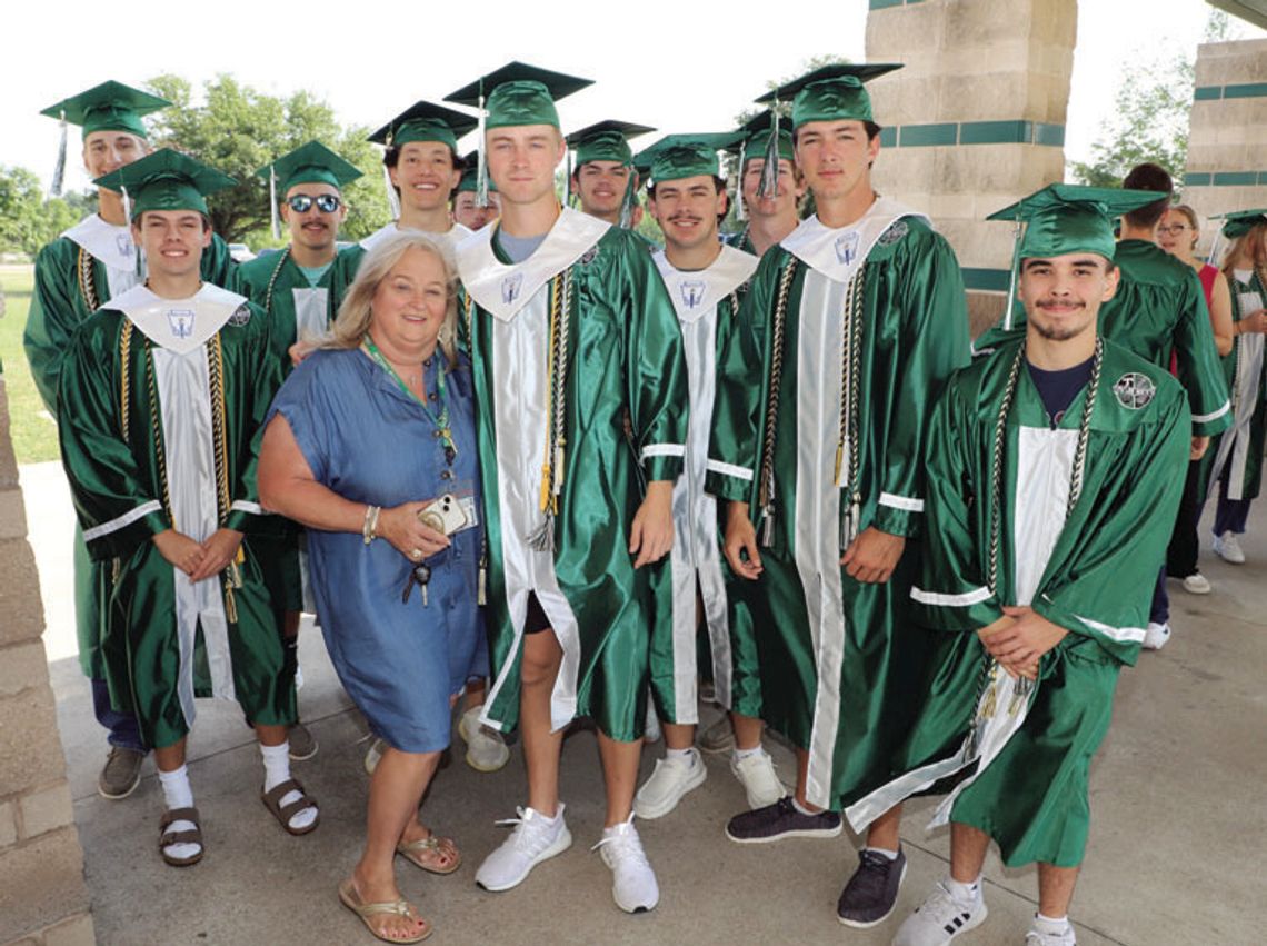 To-be graduates at Taylor High School take a walk aound Naomi Pasemann Elementary School last week. Photo courtesy of the Taylor ISD Facebook page