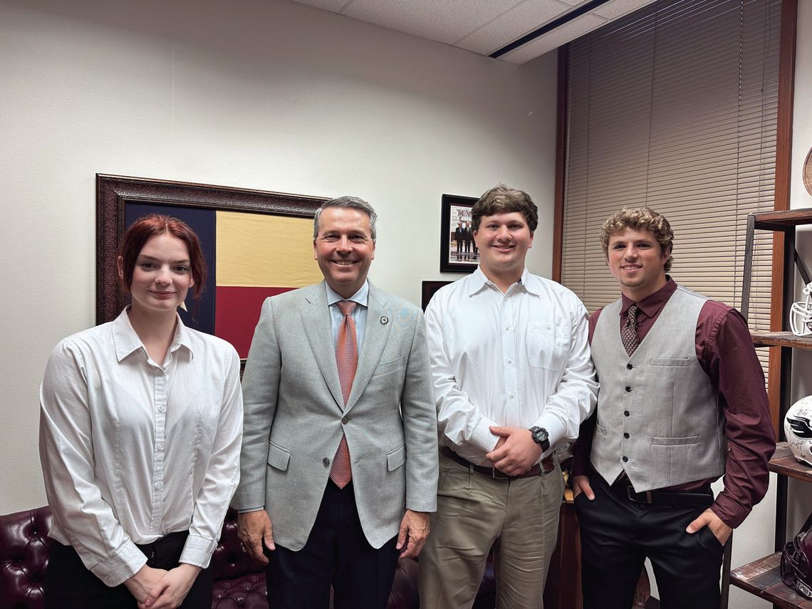 (From left) Students Alex Harwell, House Chair Representative Brad Buckley, Cody Klaus and Nate Tucker. Photos courtesy Granger Independent School District