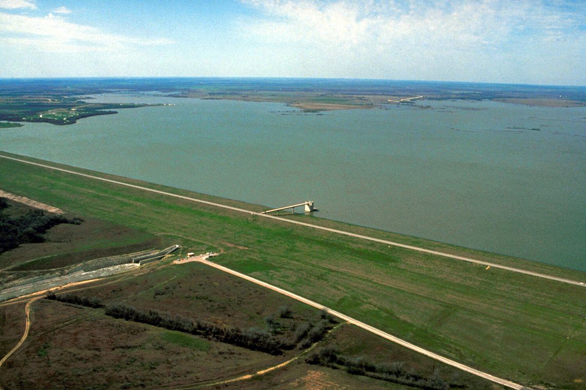 Pictured is an aerial view of Granger Lake and Dam on the San Gabriel River in Williamson County. The dam is located approximately 10 miles north-northwest of Taylor. The U.S. Army Corps of Engineers constructed the dam in 1980 for flood control and water supply. This view is toward the so...