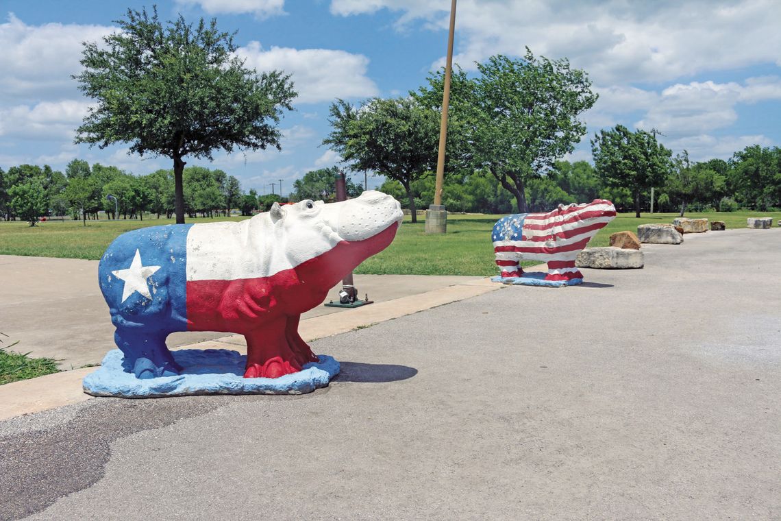 American and Texan hippos at the entrance to Fritz Park, 400 Park Street, are two of the dozens of hippos listed on the city’s map. Photo by Edie Zuvanich.