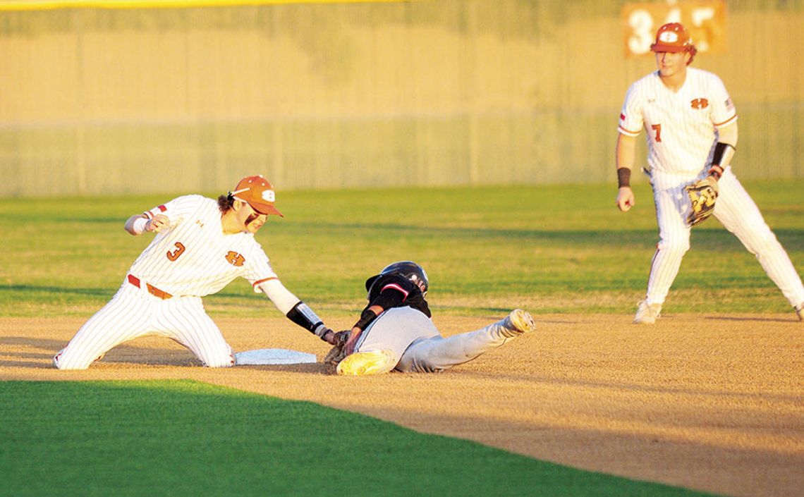 Levi Fletcher tagging a runner out at second to close out an inning for the Hippos. Photo by Larry Pelchat