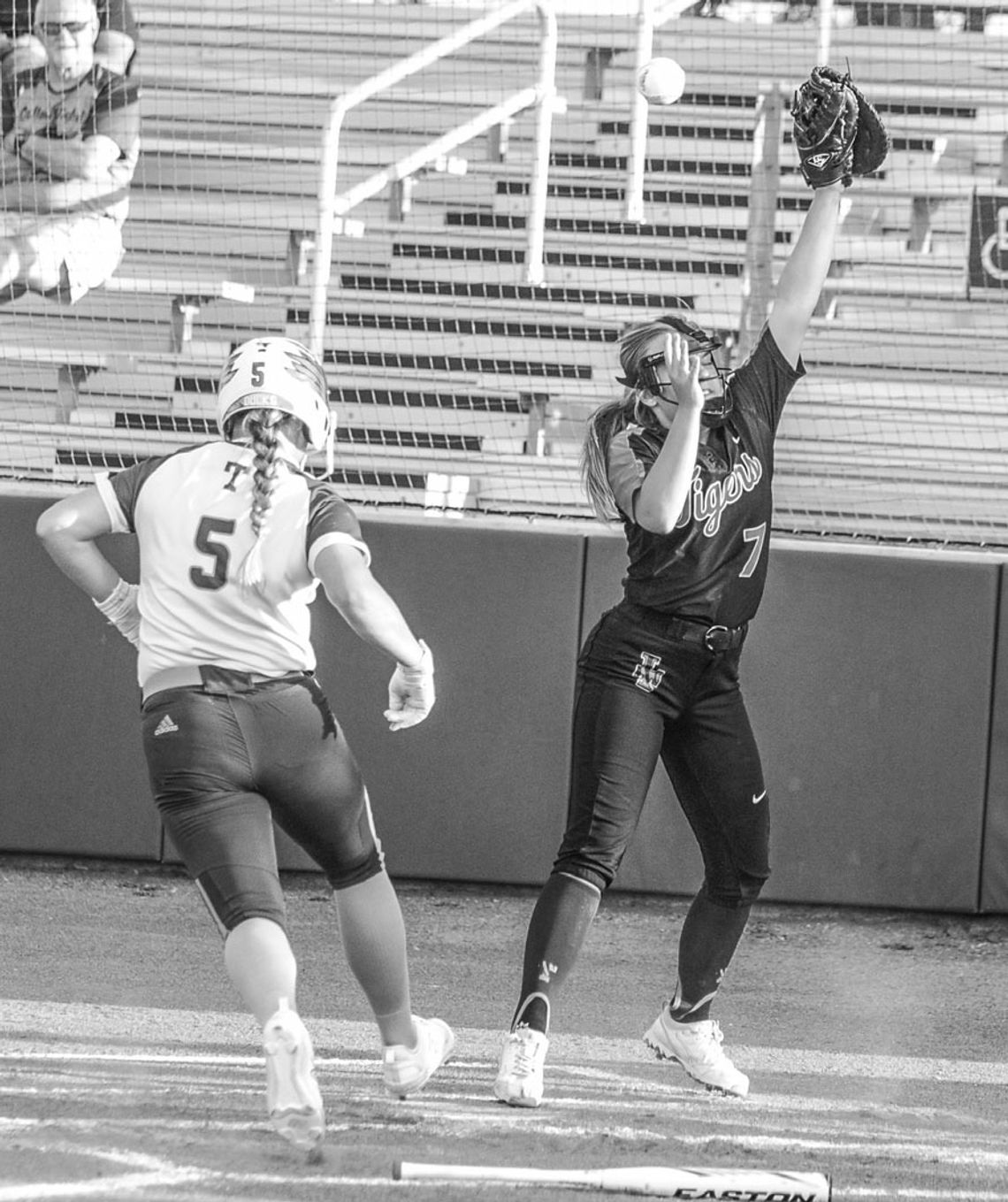 Camryn Nunamaker trots into home plate standing up for an easy point for the Lady Ducks. Photo By Larry Pelchat