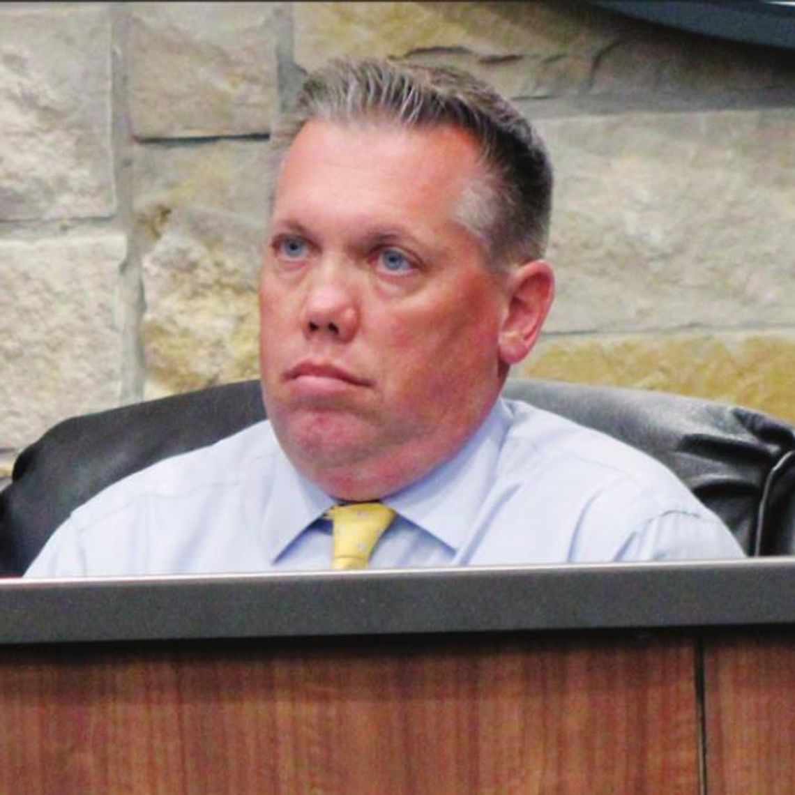 Hutto Mayor Mike Snyder listens attentively as updates on the water and wastewater plans are explained at last Thursday’s city council meeting June 16. Photo by Matt Hooks