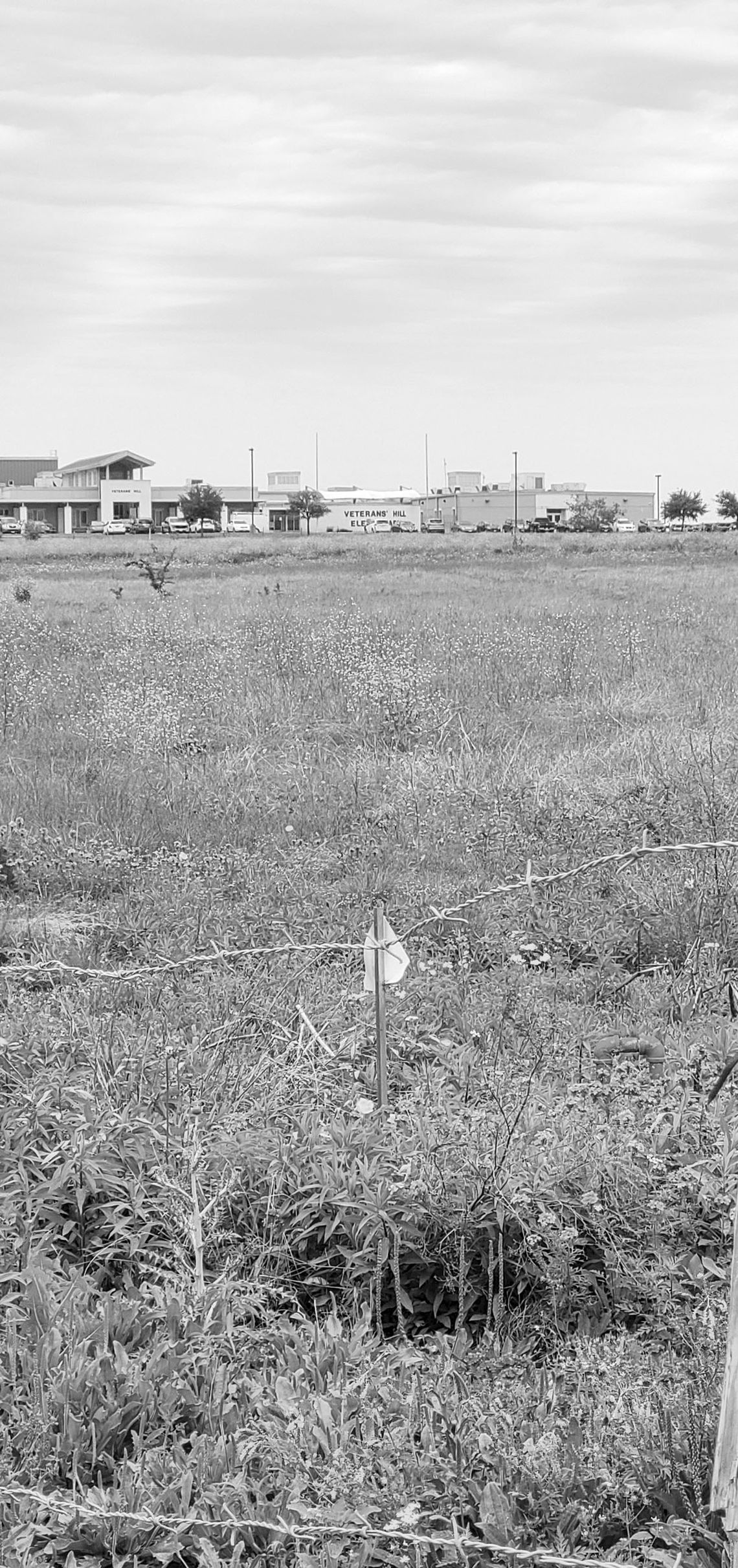 The field fronting Limmer Loop where the wastewater plant would be constructed is close to Veterans Hill Elementary School. The plant is seeking state approval for construction, but Hutto Independent School District officials are not in favor. Photo by Edie Zuvanich