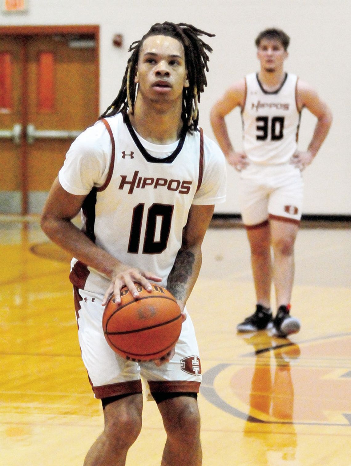 Dylon Richardson takes a moment to focus before shooting a free throw Photos by Larry Pelchat