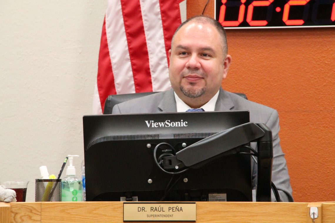 Hutto Independent School District Superintendent Raul Pena listens to a speaker at a previous school board meeting.