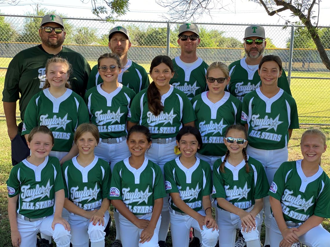 The Taylor 12 and under girls softball are left to right Lani Birkhead, Brynley Finn, Madi Gonzales, Alegra Rivera, Gracie Grimm, Hadley Gola. Standing left to right - Avery Dloughy, Lyla Morris, Whitney Drummond, AJ Masters and Jo Neiheiser. Coaches are from left to right, Brian Drummond,...