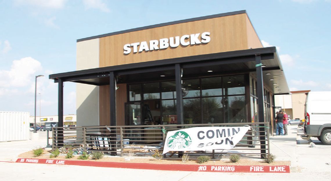 Contractors put the finishing touches on a new Starbucks location at 3116 N. Main Street, the first in Taylor. Photo by Nicole Lessin