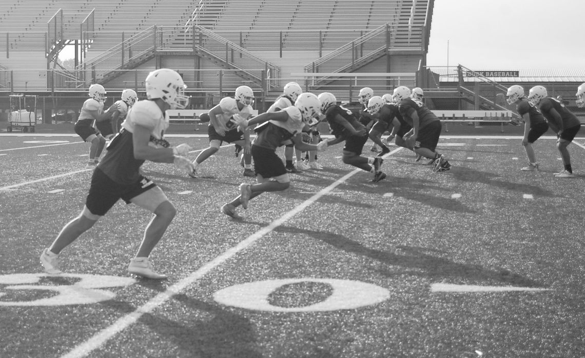 Ducks varsity football has its first day of practice in full pads and helmets on Aug. 6, 2022, at Taylor Stadium. Photos by Evan Hale