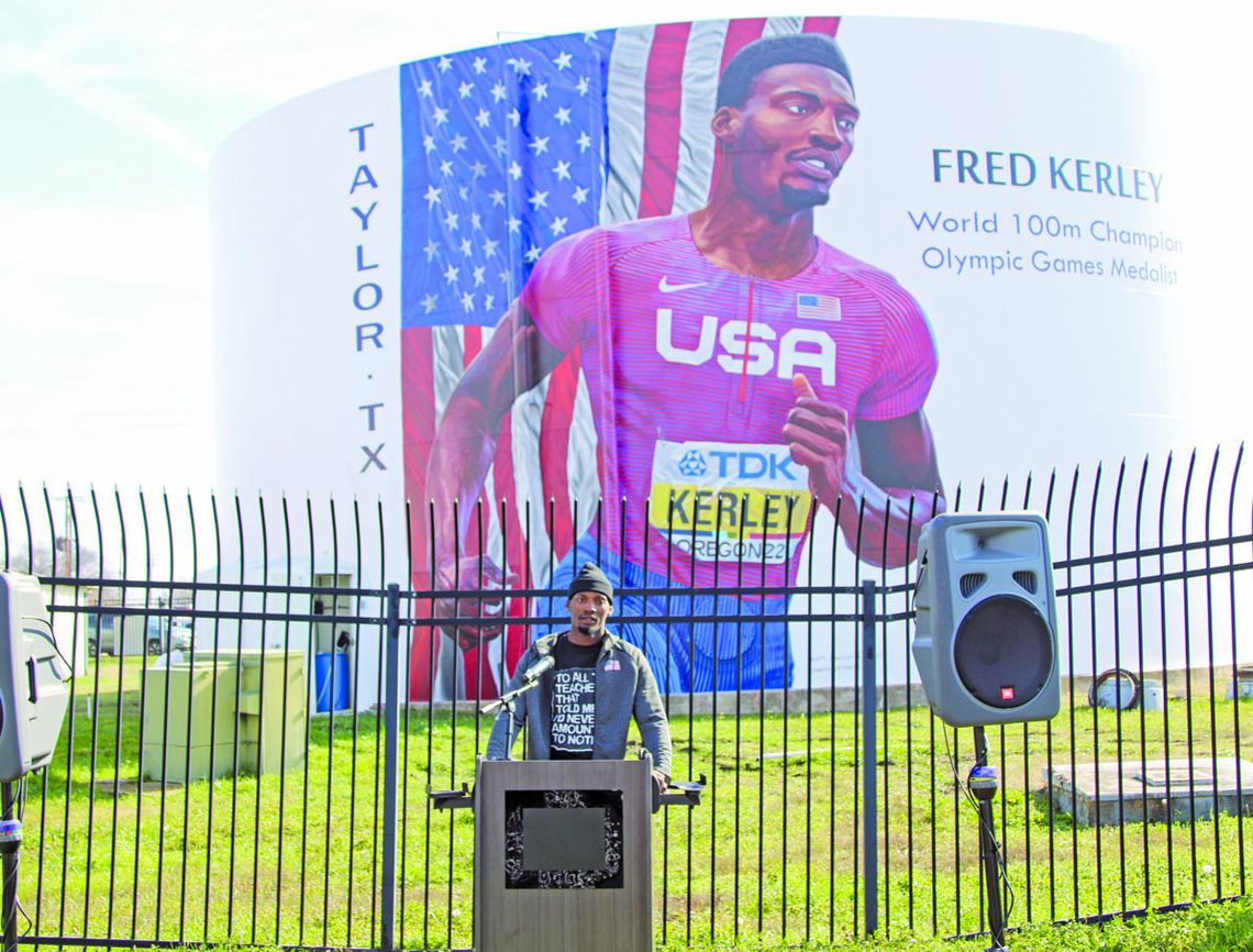 Fred Kerley thanks the Taylor community on Feb. 4 for its support of him and his family at the mural dedication. Photo by Jason Hennington