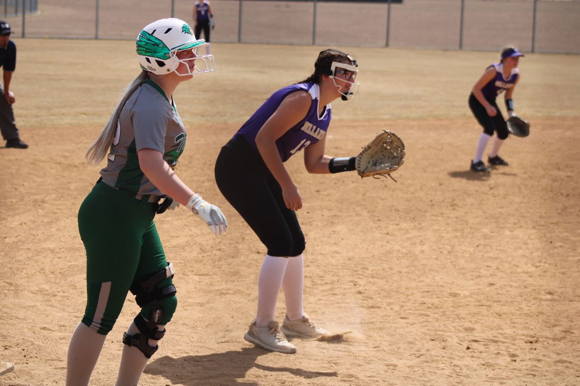 Kennan Nunamaker stands at third base ready to race home against Holland on day one of the Lady Ducks tournament. 